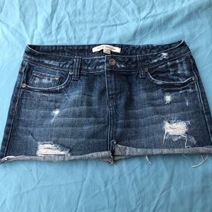 Distressed jean mini skirt